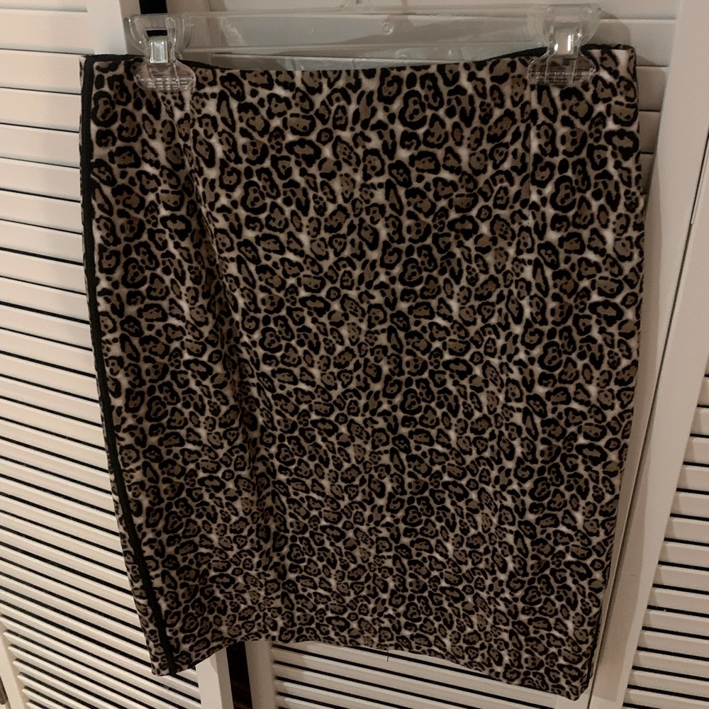 Womens cheetah print pencil skirt with black stripe, gold zipper and back slit